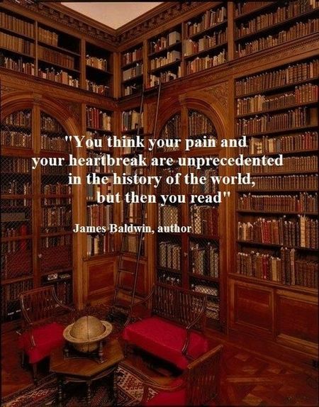An old-looking, multistory set of packed bookshelves with a quotation superimposed. 'You think your pain and your heartbreak are unprecedented in the history of the world, but then you read.' James Baldwin, author